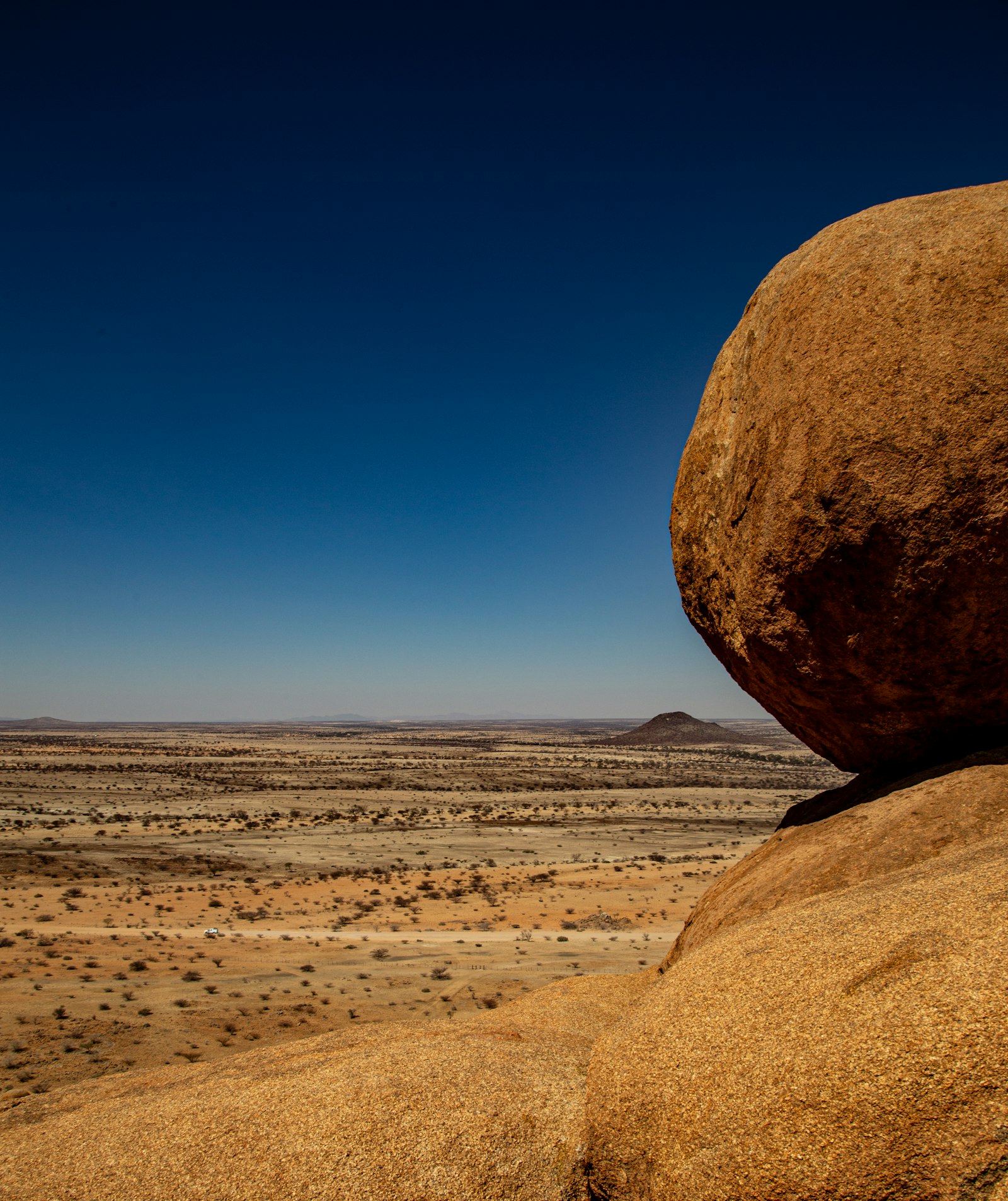 Large rock formation in an arid southern African landscape